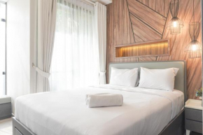Gorgeous and Comfortable 1BR Sudirman Suites Apartment By Travelio